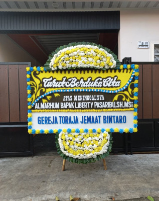 Papan Bunga Duka di Payolansek